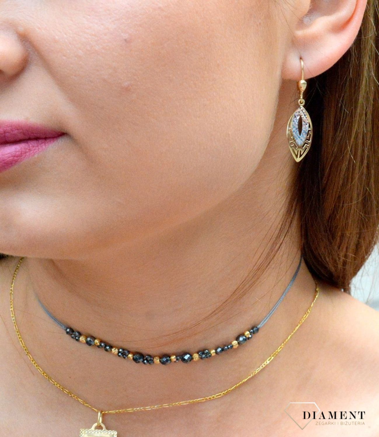 Kolczyki złote pr 333 długie ażurowe z białym złotem KL 5751 333. Od minimalistycznych zdobień po intensywne i nowoczesne formy. Olśniewające kolczyki wykonane z wysokiej jakości 8-karatowego żółtego złota i białego złota, pró.jpg